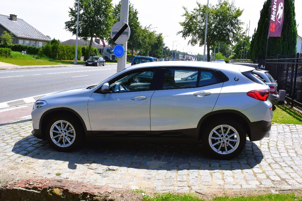 BMW X2 sDrive18i/Automaat/1st Owner/HISTORY/GARANTIE, Auto's, BMW, Bluetooth, 5 zetels, SUV of Terreinwagen, Zilver of Grijs
