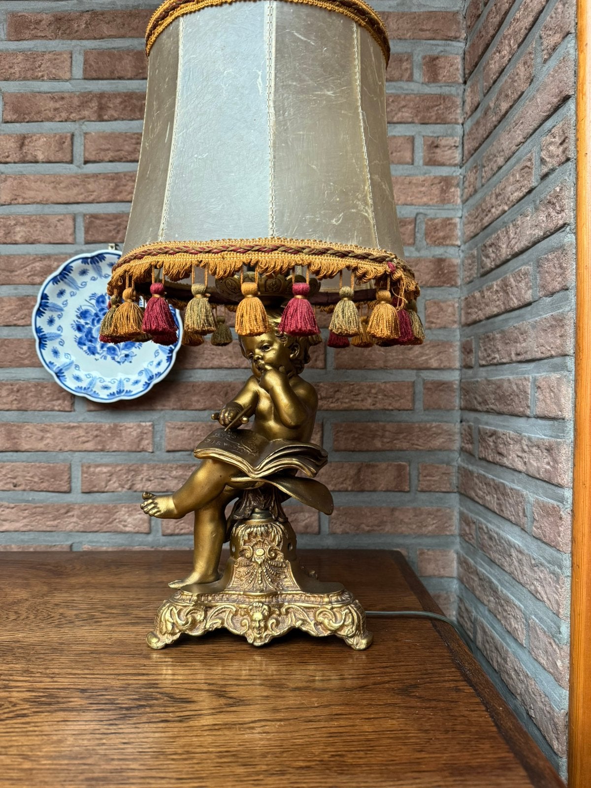 Bronzen tafellamp, Enlèvement