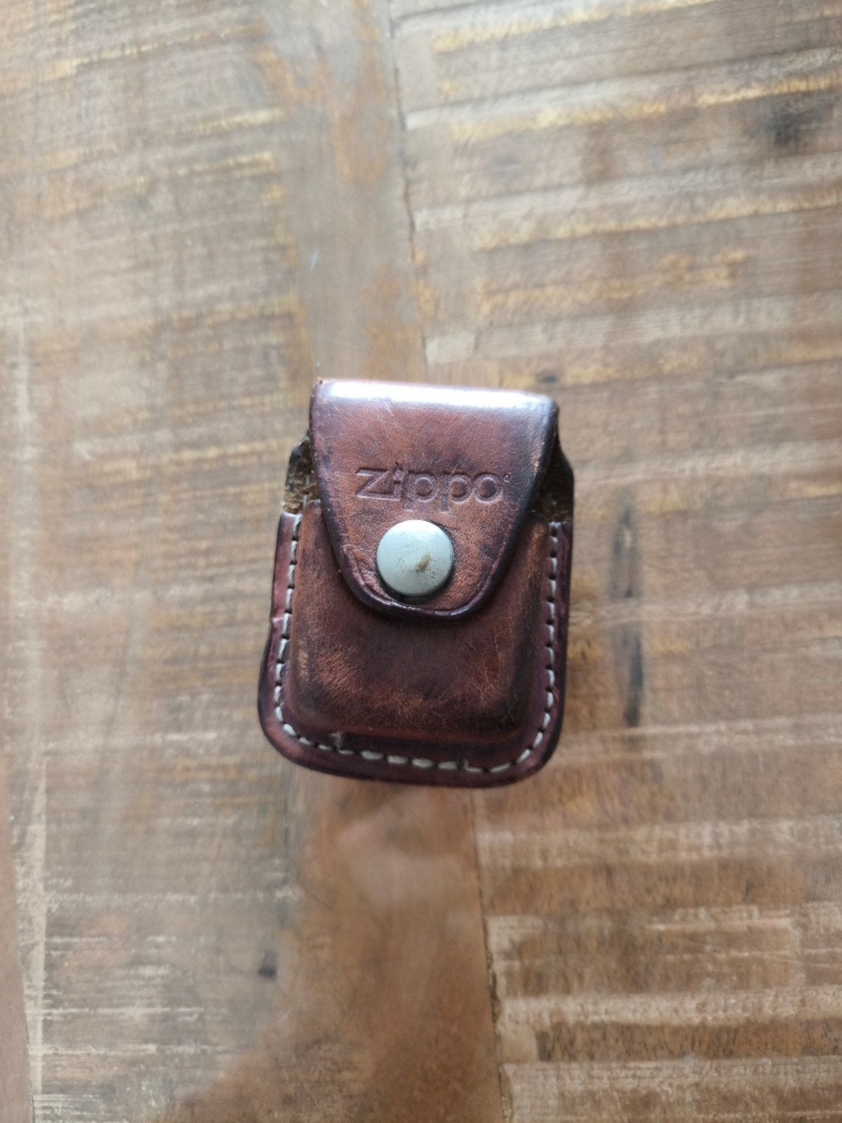 zippo hoesje, Enlèvement