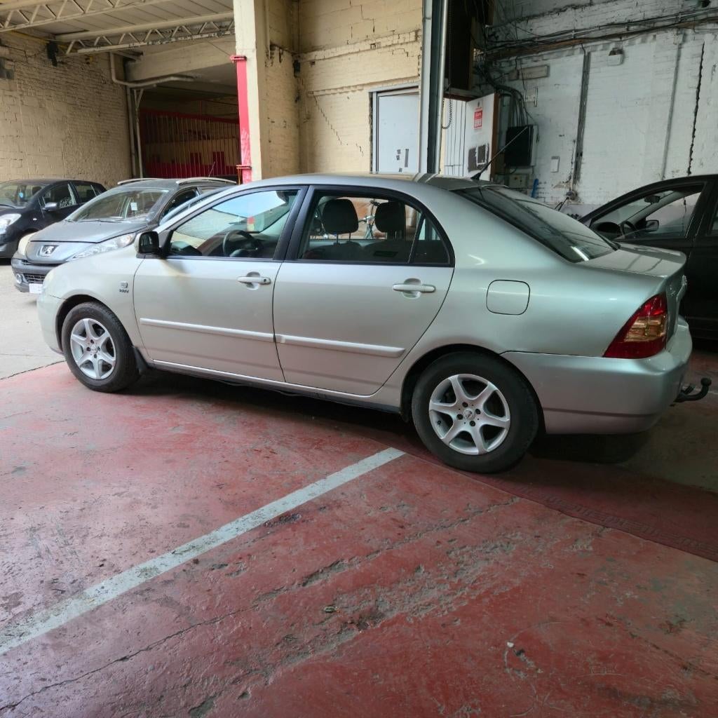 Toyota Corolla Alpha 2005, Auto's, Voorwielaandrijving, 4 deurs, Stof, Zwart