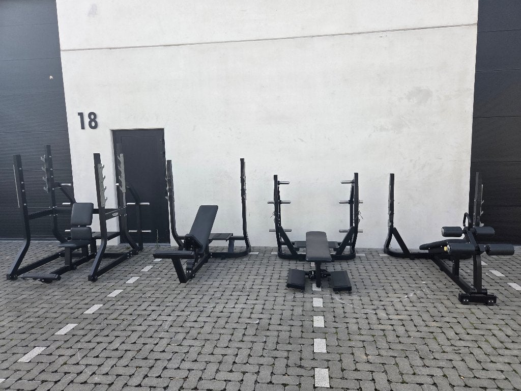 Technogym Pure Strenght Olympic Bench set van 4, Ophalen, Zo goed als nieuw, Armen, Fitnessbank