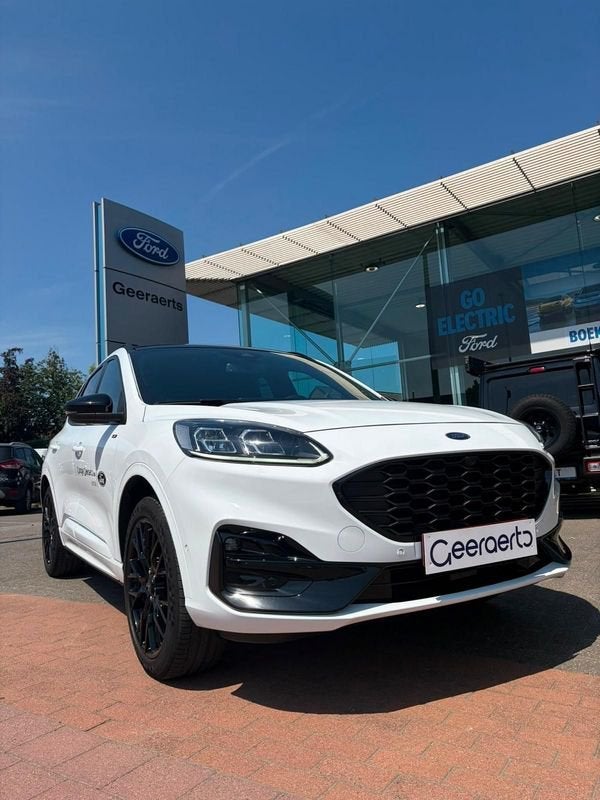 Ford Kuga ST-Line X 2.5i PHEV 225pk/165kW - Auto, Auto's, Ford, Gebruikt, Zwart, Leder en Stof, Wit