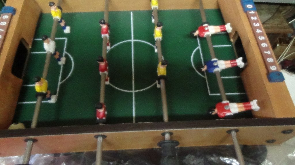 tafelvoetbal spelletje, Ophalen