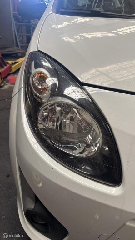 Koplamp rechts Renault Twingo II ('07-'14), Auto-onderdelen, Gebruikt, Renault, Ophalen of Verzenden, Renault