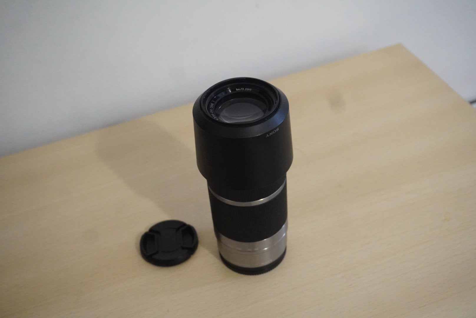 Sony 55-210mm OSS zoomlens + zonnekap | Perfecte staat, Audio, Tv en Foto, Foto | Lenzen en Objectieven, Zo goed als nieuw, Telelens