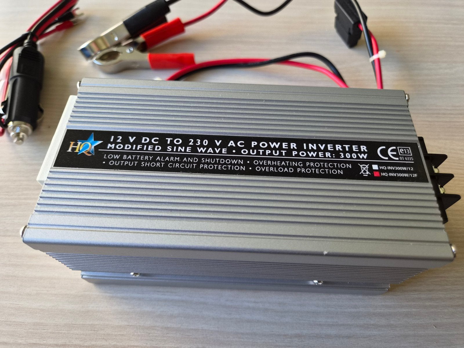 Power inverter 12 volt naar 230, Ophalen