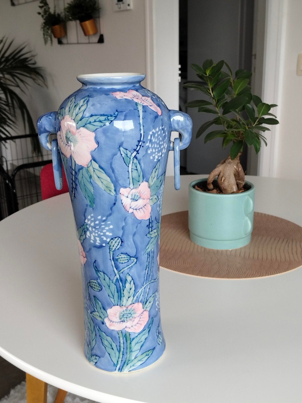 grote blauwe vaas, Ophalen