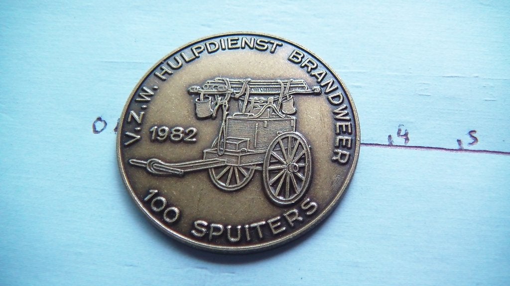 médaille putte 1982 cuivre, Enlèvement