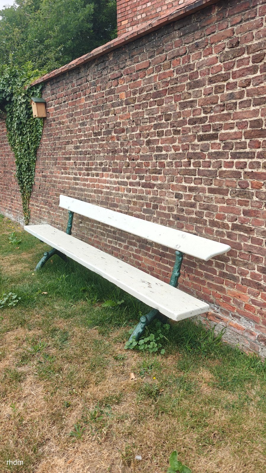 Tuinbank met gietijzeren poten, Ophalen