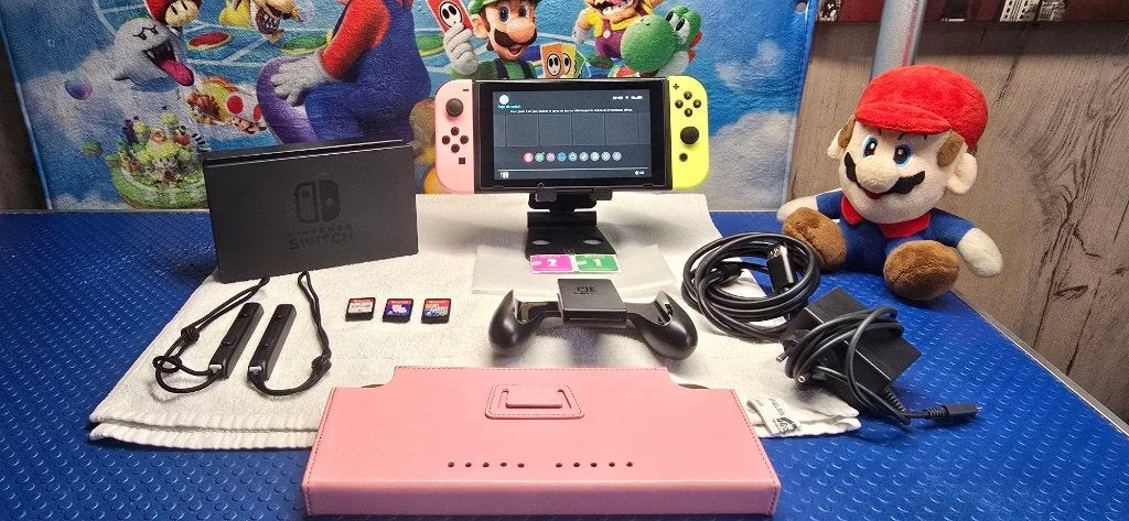 Nintendo switch-console + 3 games + garantie (compleet), Games en Spelcomputers, Ophalen of Verzenden, Zo goed als nieuw