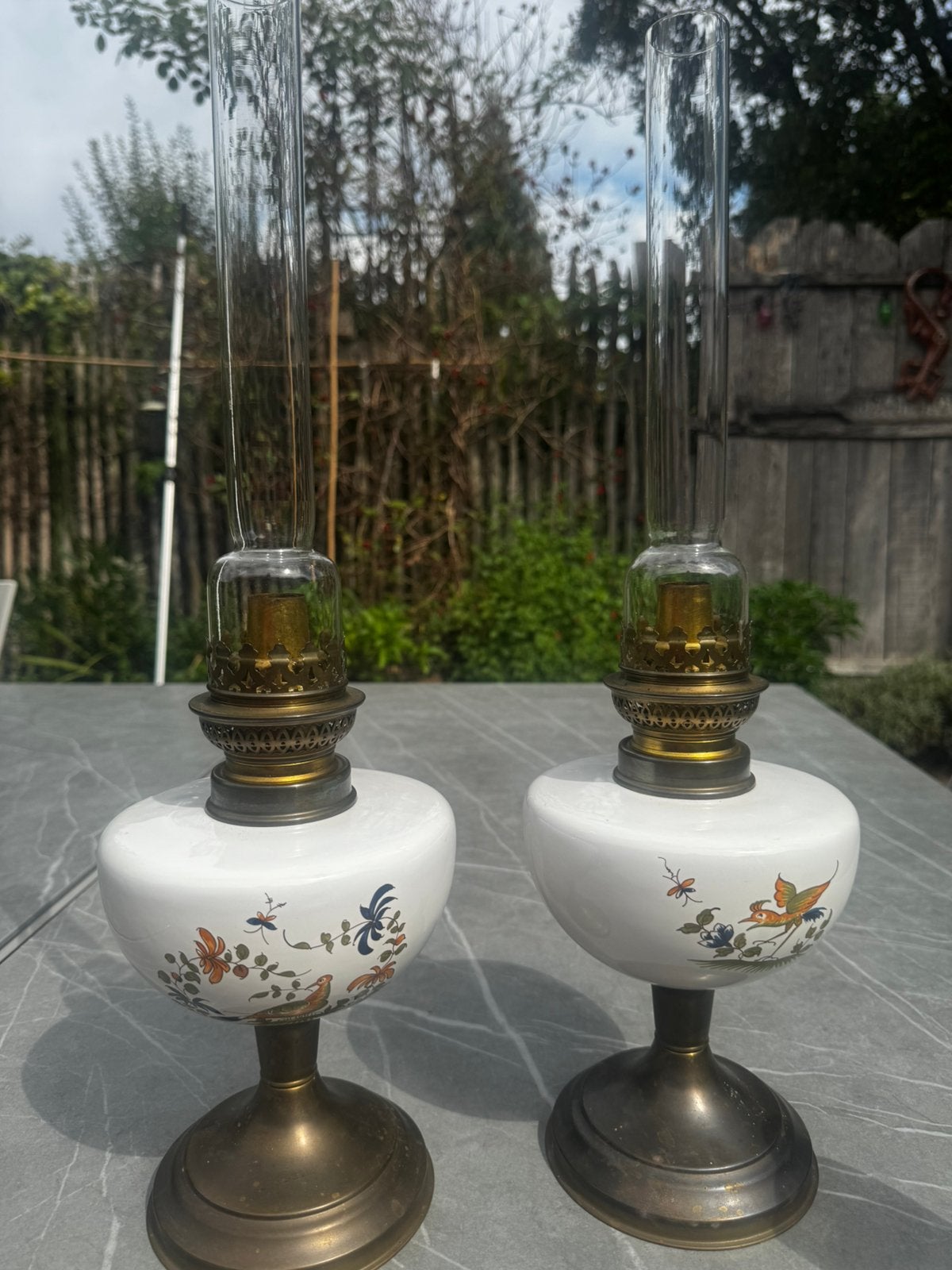 2 bronzen olielampen met keramiek, Ophalen