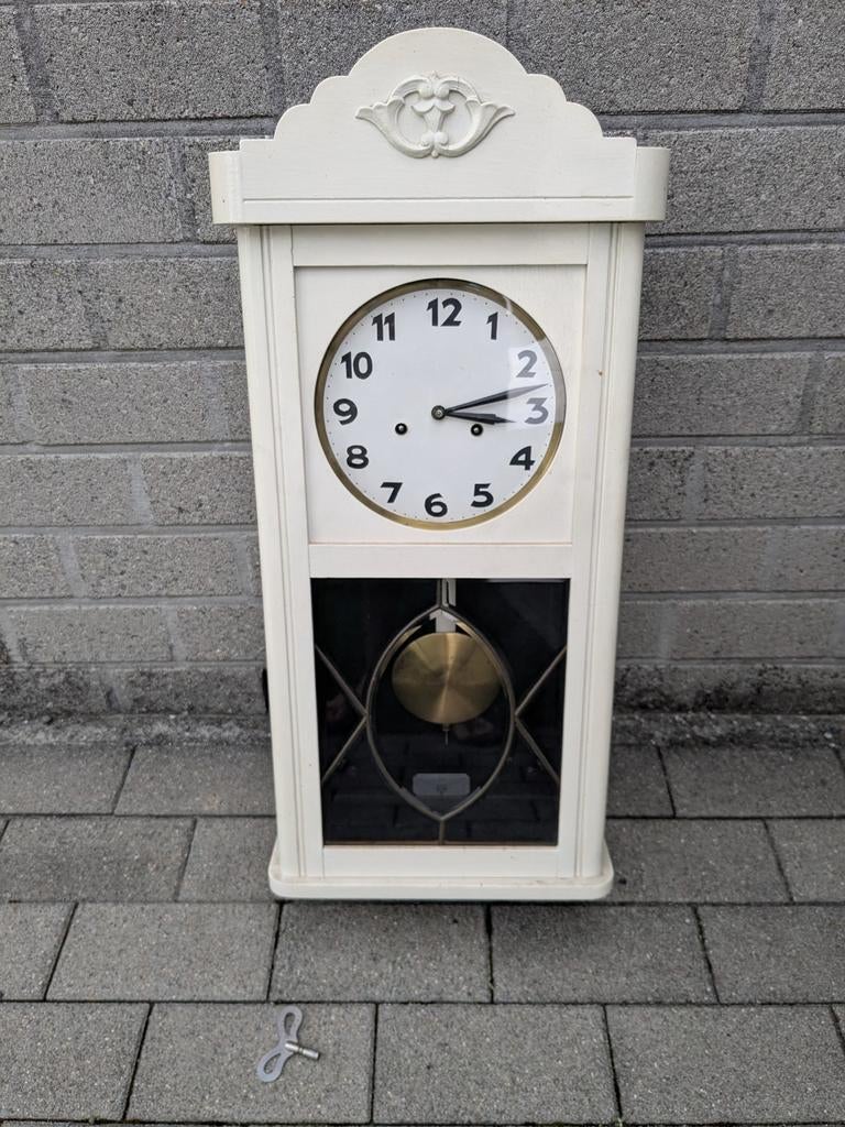 Antieke houten wandklok Junghans, Ophalen