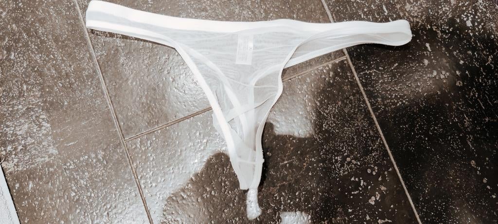 Transparante string l-xl, Ophalen