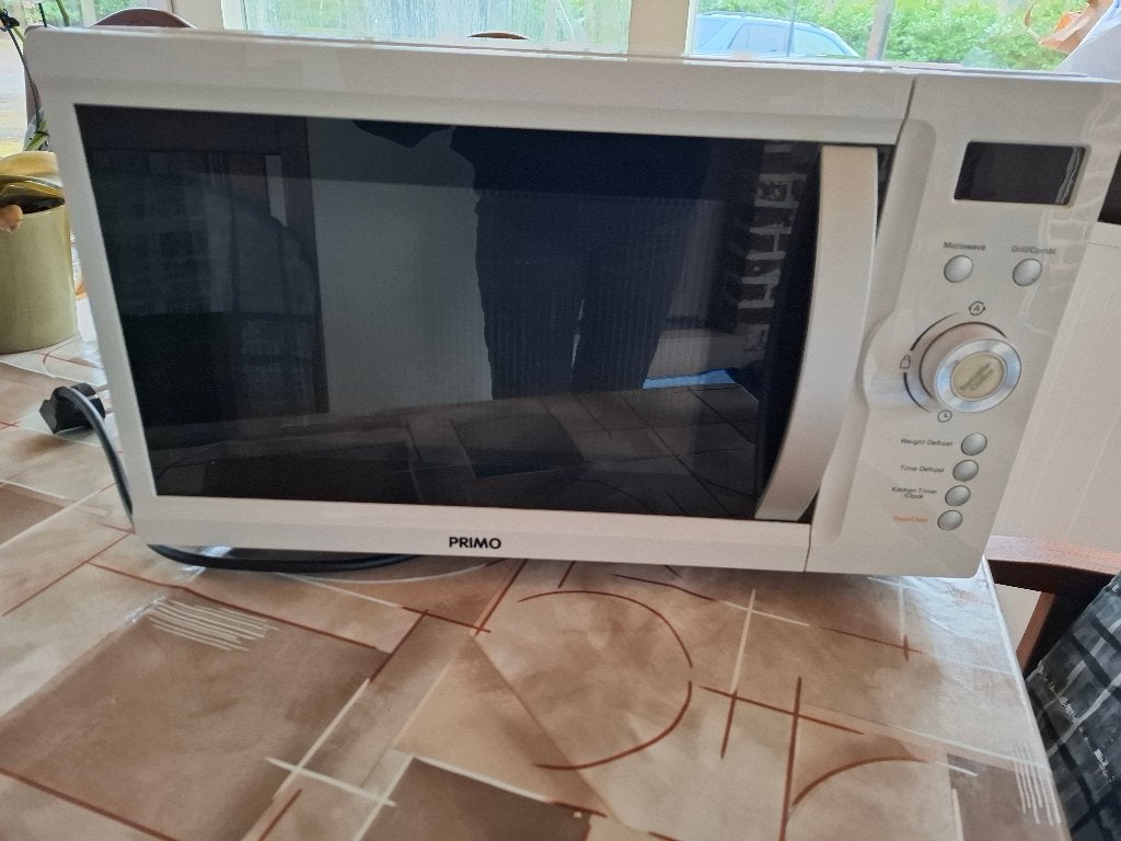microgolf oven, Ophalen, Zo goed als nieuw