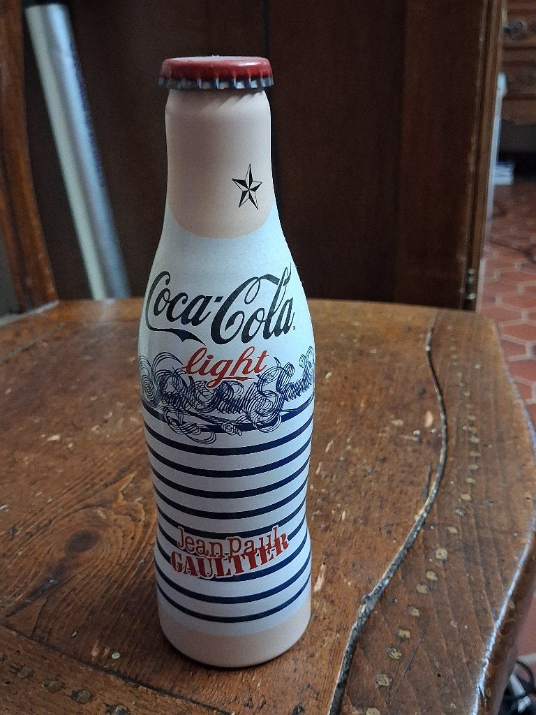 bouteille de coca ancienne, Enlèvement
