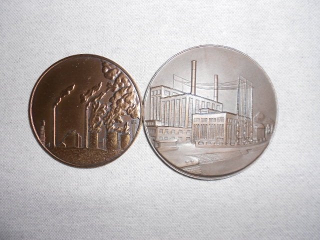 2 bronzen medailles Intercom en Electrabel, Enlèvement