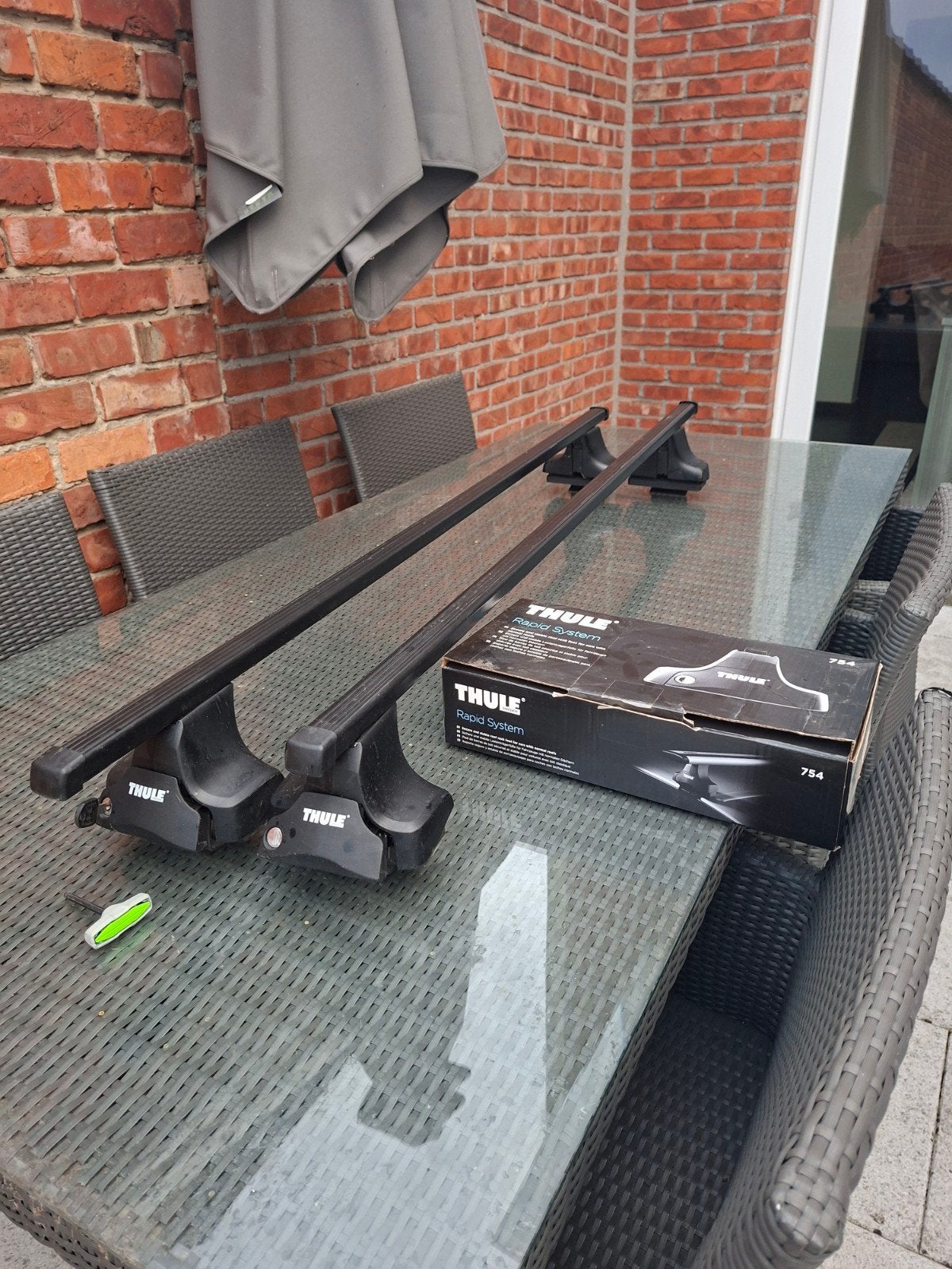 Universele dakdragers thule 135 cm voor platdak, Ophalen