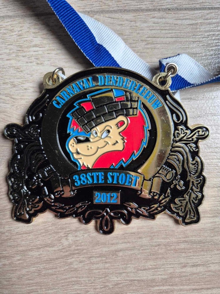 Carnaval medaille Denderleeuw 2012, Enlèvement ou Envoi