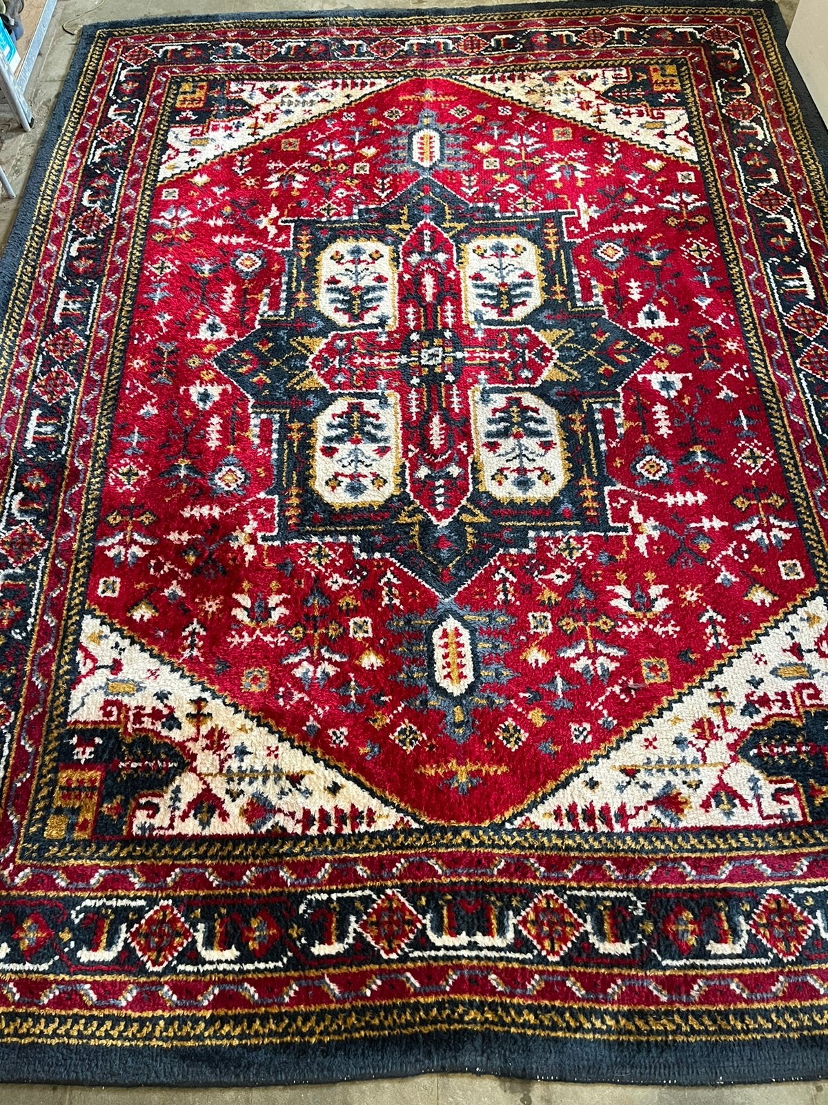 tapis noué à la main authentique, Enlèvement