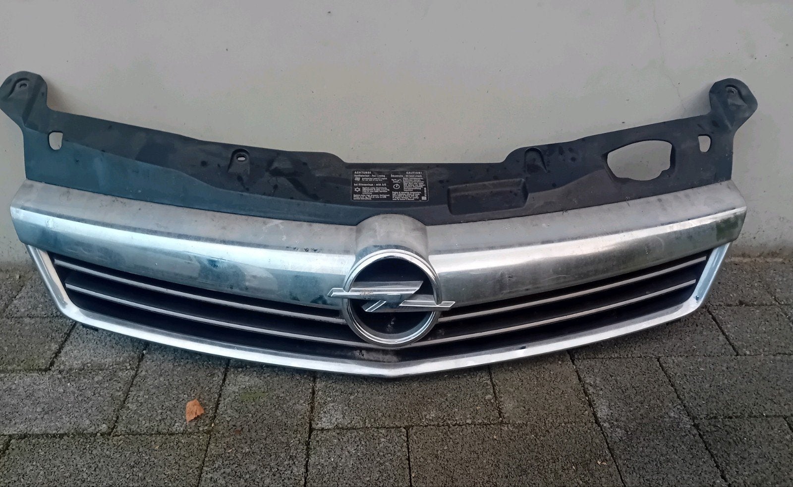 Chroom grill Opel Astra H 5 deurs en break, Gebruikt, Voor, Opel, Ophalen of Verzenden