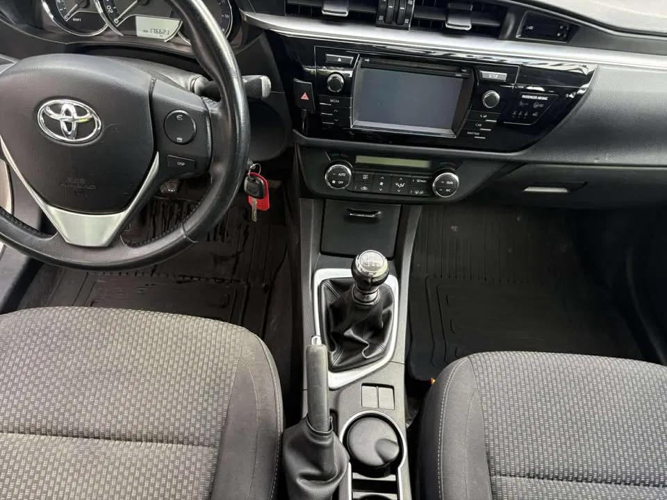 Toyota Corolla (bj 2014), Auto's, Euro 5, Stof, Gebruikt, Zwart