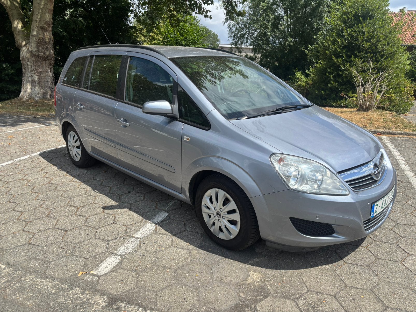 Zeer mooie Opel Zafira 7pl benzine met keuring en garantie., Autos, Opel, Argent ou Gris, Entreprise, 7 places, Boîte manuelle