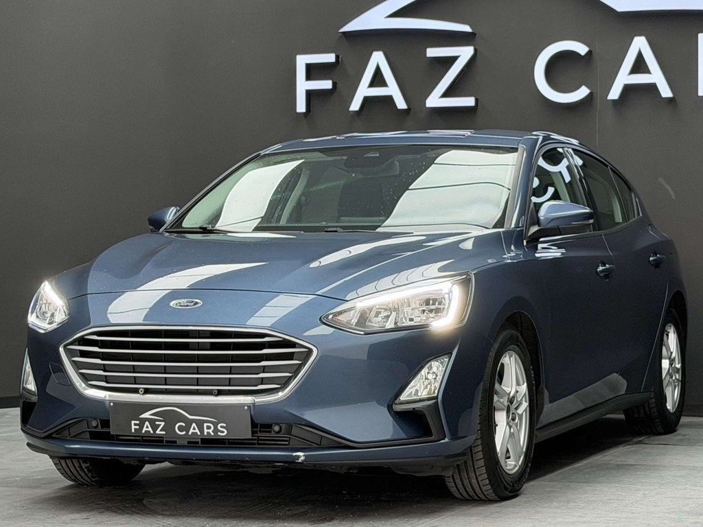Ford Focus 1.0 EcoBoost Titanium * 1ER PROP + CAMÉRA + GPS, Auto's, Ford, 116 g/km, Gebruikt, 1905 kg, Blauw