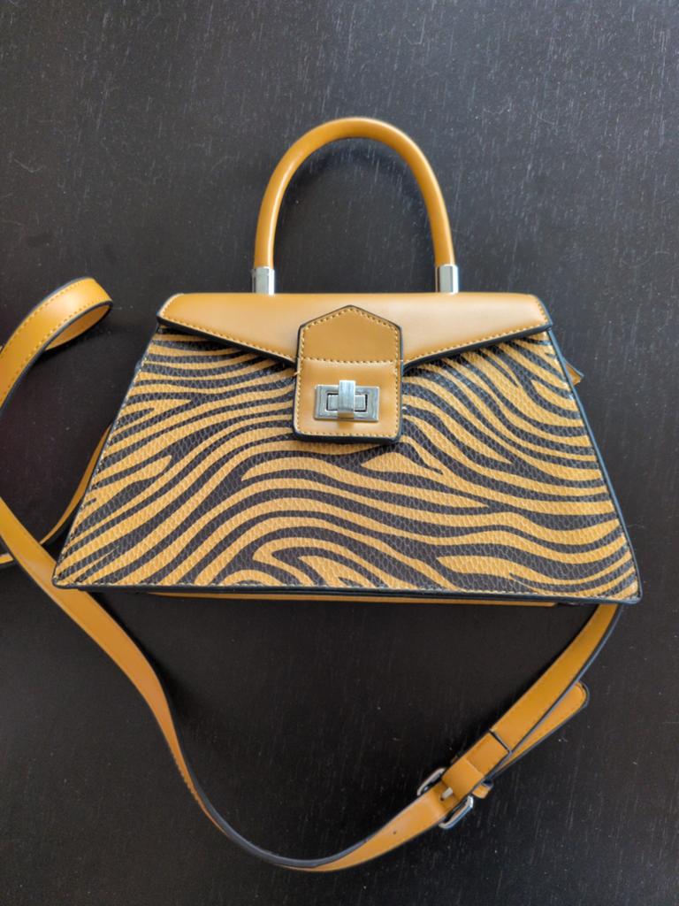Sac à main zébré, Enlèvement, Sac à main