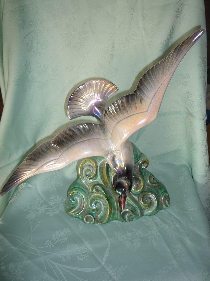 antieke keramiek vogel, Ophalen