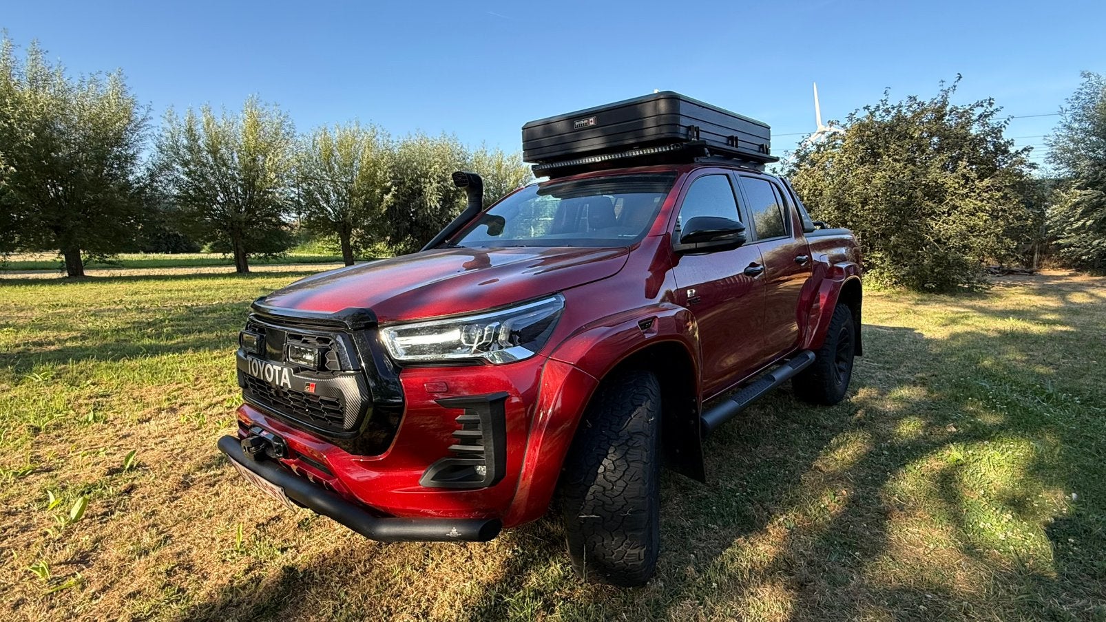 Hilux GR sport AT35 actic trucks, Autos, Toyota, Rouge, Cuir et Alcantara, 224 kW, Entretenue par le concessionnaire