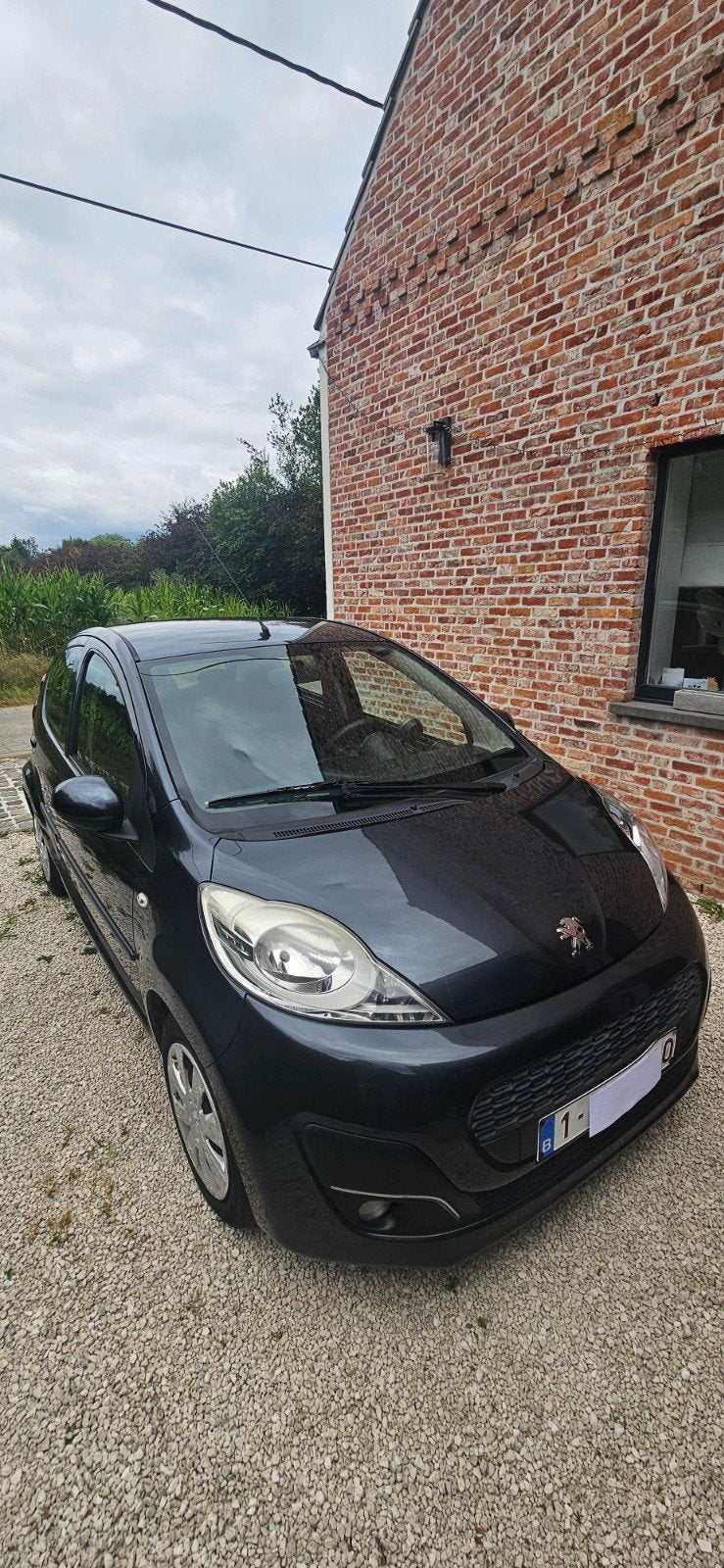 Peugeot 107 1.0 (5 deurs) , bj 2013 met maar 90740 km., Auto's, Voorwielaandrijving, Euro 5, Stof, Zwart