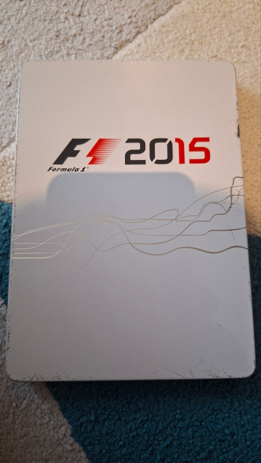 Boîtier en acier pour PS4 Formula 1 2015, 1 joueur, Comme neuf, Course et Pilotage, Enlèvement