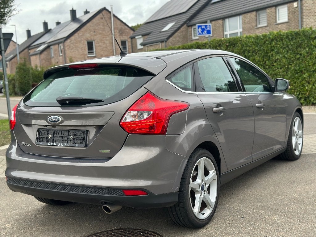 Ford Focus 1.6 Benzine Euro5b GPS 1e eigenaar, Auto's, Focus, Euro 5, Stof, https://public.car-pass.be/vhr/8d1e3e38-b3a9-467e-952f-45123b34b9d5