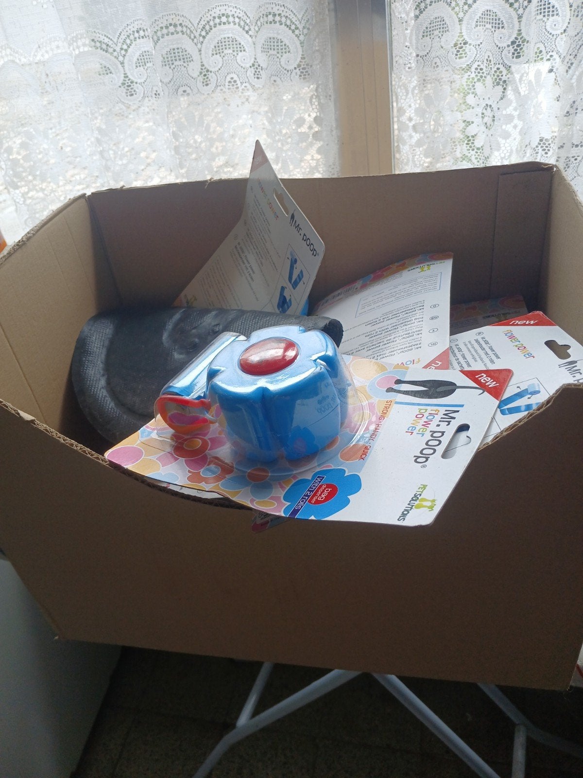 Doos met 20 tal, poepzakhoeders + poepzakjes, Enlèvement