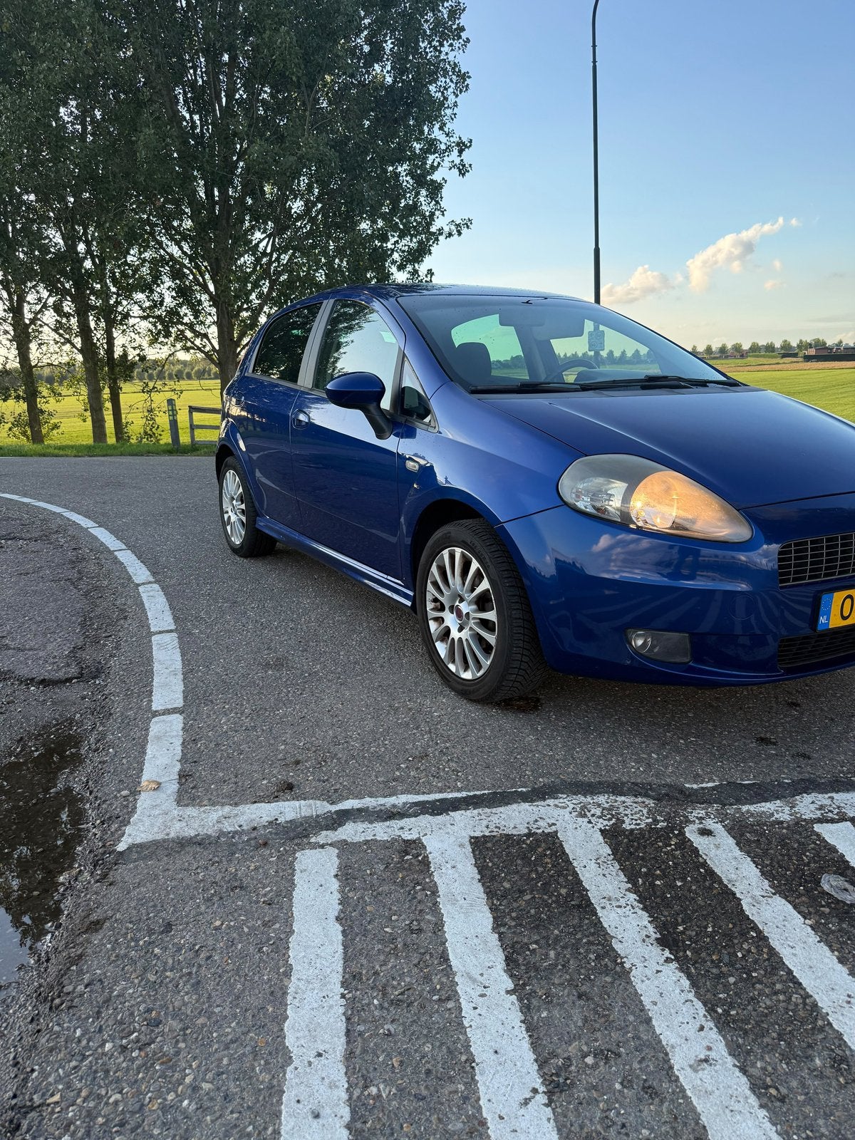 Fiat Punto Grande 1.4, 5 portes, climatisation, versionsport, Autos, 57 kW, Achat, Boîte manuelle, Noir