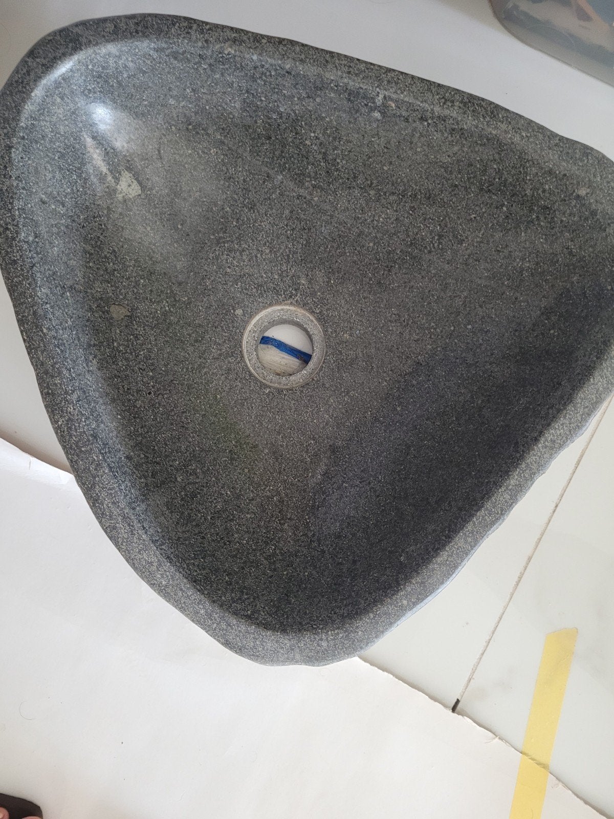 Handenwasser in rivierkei, Enlèvement