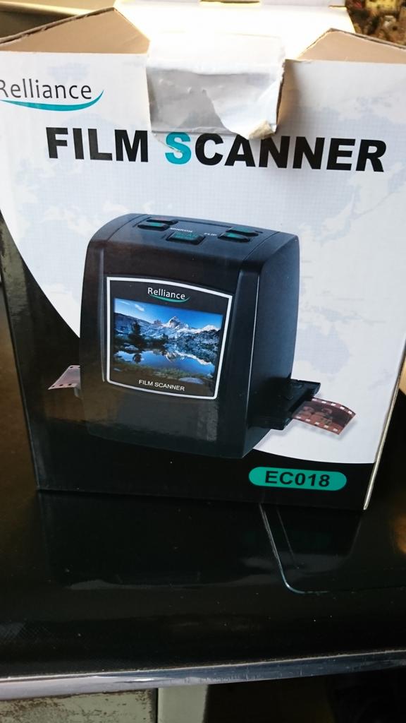 Apparaat voor het digitaliseren van foto's en dia's, Ophalen