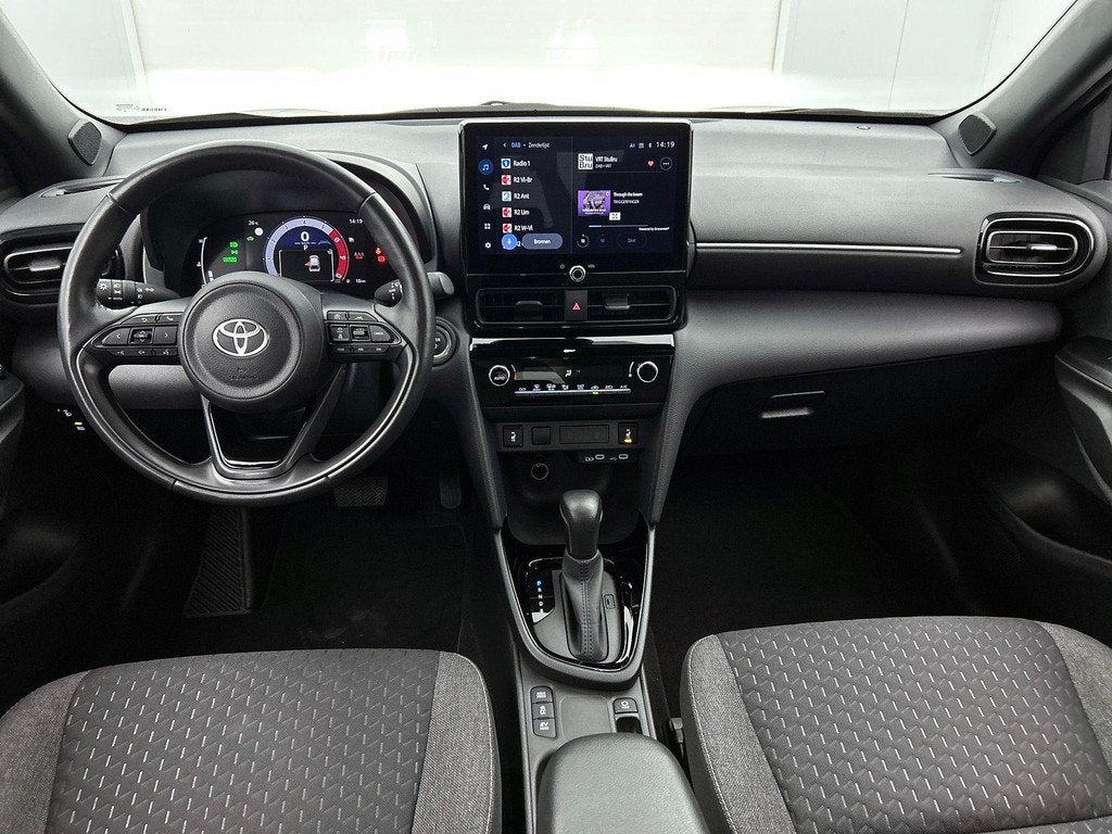 Toyota Yaris Cross 1.5 VVT-ie Hybrid 85kW Dynamic Plus CVT, Auto's, Toyota, Stof, Gebruikt, Overige kleuren, 116 pk