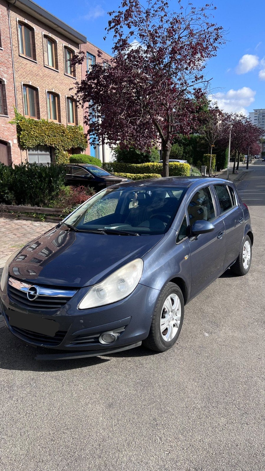 Opel corsa 1.2 benzine bouwjaar 2009 km 208.000, Zwart, Blauw, Bedrijf, Handgeschakeld