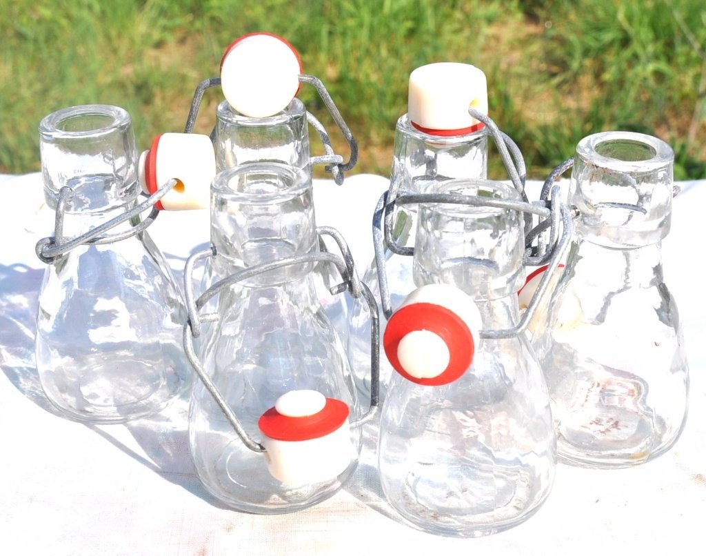 6 mini bouteilles avec bouchons a cliquet, Enlèvement ou Envoi, Comme neuf, Blanc, Verre