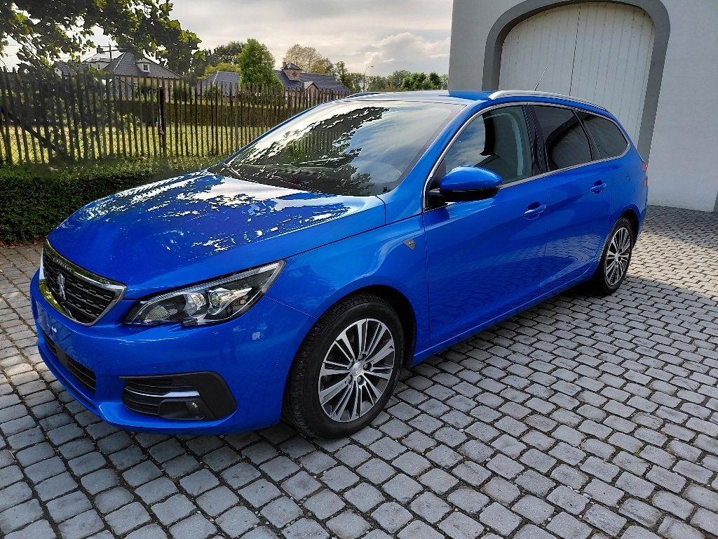 Peugeot 308 SW1.3 130 pk automaat, Auto's, Dealer onderhouden, 1199 cc, Blauw, Leder en Stof