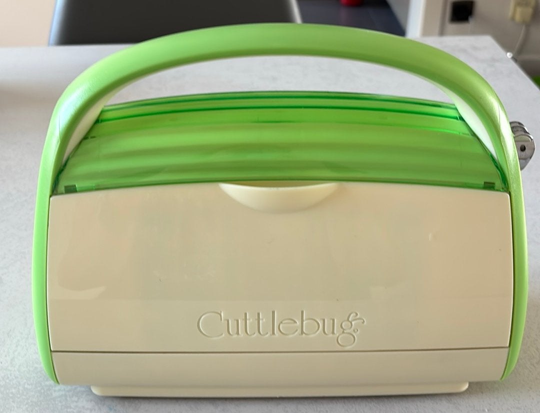 Originele Cuttlebug embossing machine, Hobby en Vrije tijd, Ophalen of Verzenden, Zo goed als nieuw, Cuttlebug