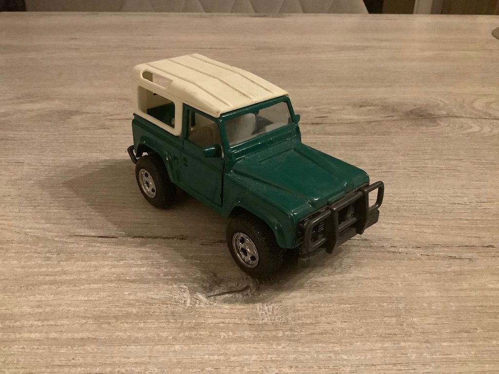 Miniatuur Land Rover Defender auto (Schaal 1/32), Ophalen of Verzenden, Gebruikt, Auto, Overige merken