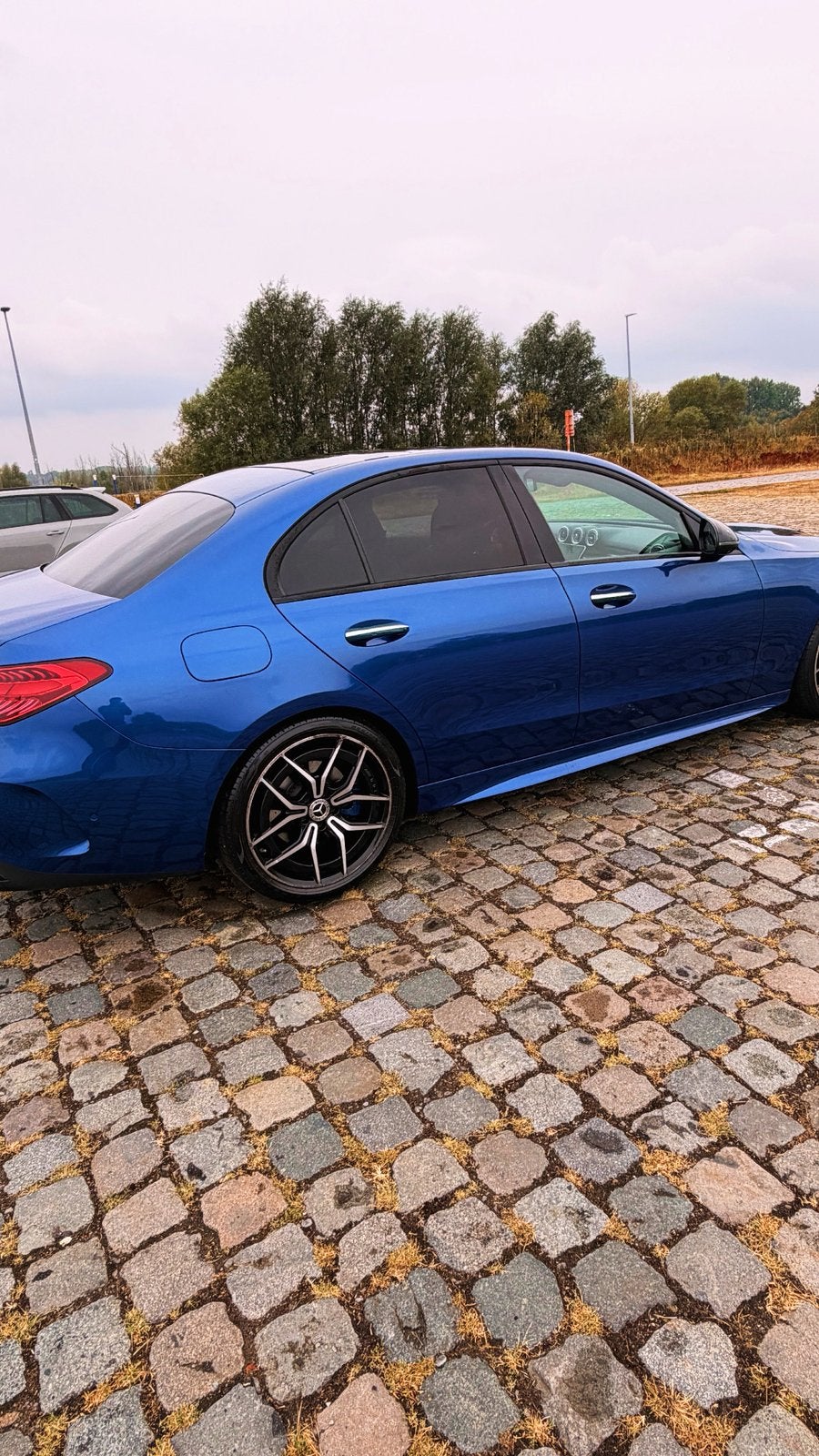 Mercedes-Benz C 180 AMG Line | W206 | Pano | 360 Camera, Auto's, Automaat, Achterwielaandrijving, Blauw, Leder en Stof