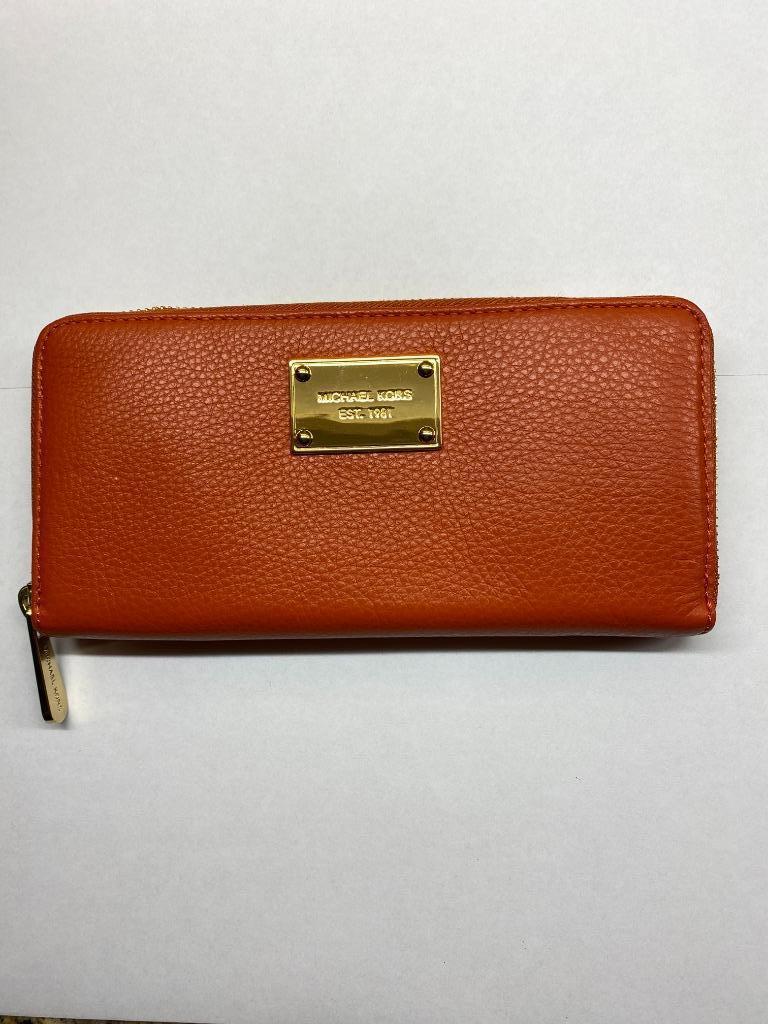 Mooie Michael Kors portemonnee, in nieuwstaat, Handtassen en Accessoires, Nieuw, Oranje, Leder, Ophalen