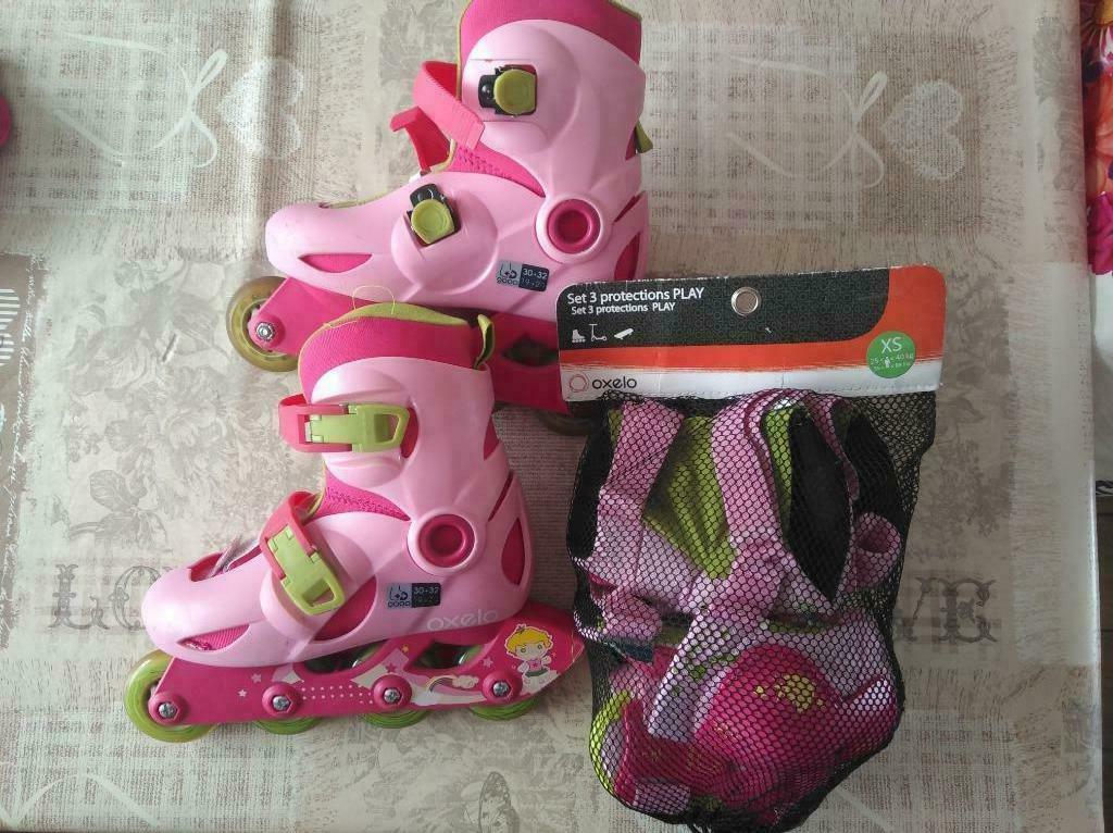 Rollerblades Oxelo Roze maat 30-32 + bescherming, Enlèvement ou Envoi, Utilisé