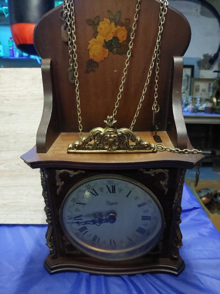 Urgos wandklok slinger - mechanisch, met kettingen, Antiek en Kunst, Ophalen