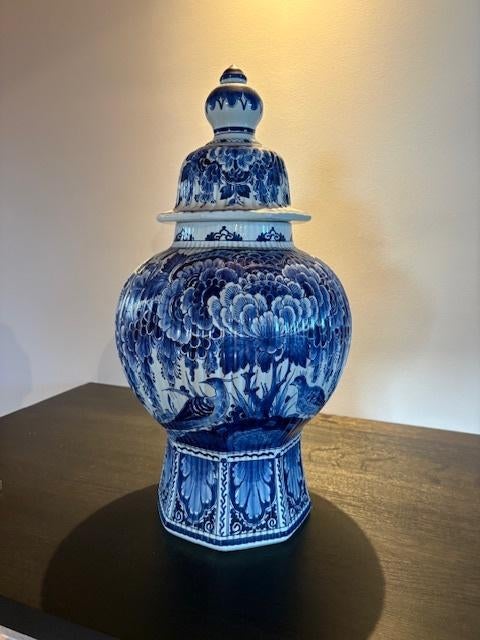 Delfts blauwe vaas, Ophalen