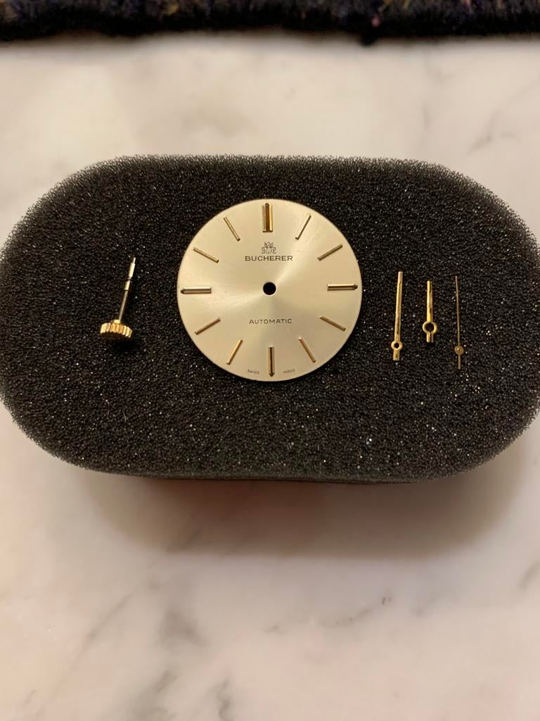Aiguilles, couronne et cadran Bucherer ETA 2670, Montre-bracelet, Autres marques, Enlèvement ou Envoi, 1960 ou plus tard