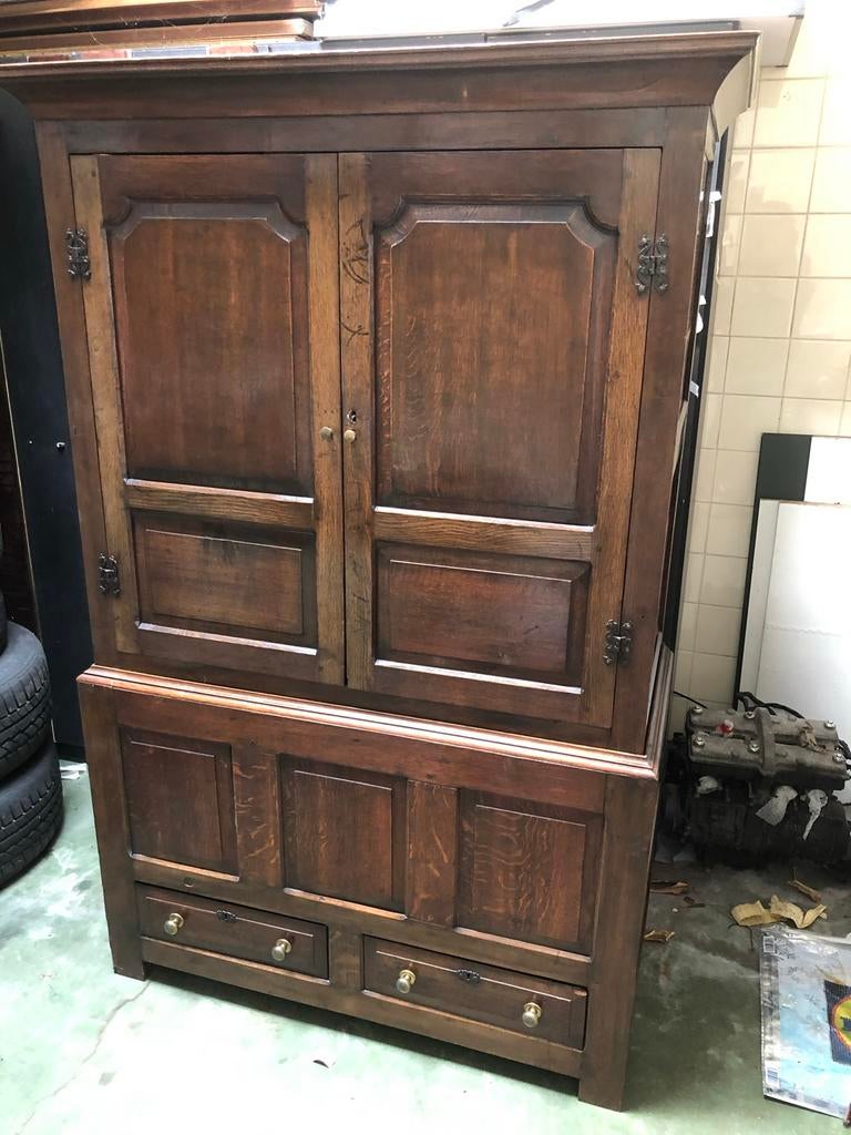 Antieke volhouten kast, Ophalen
